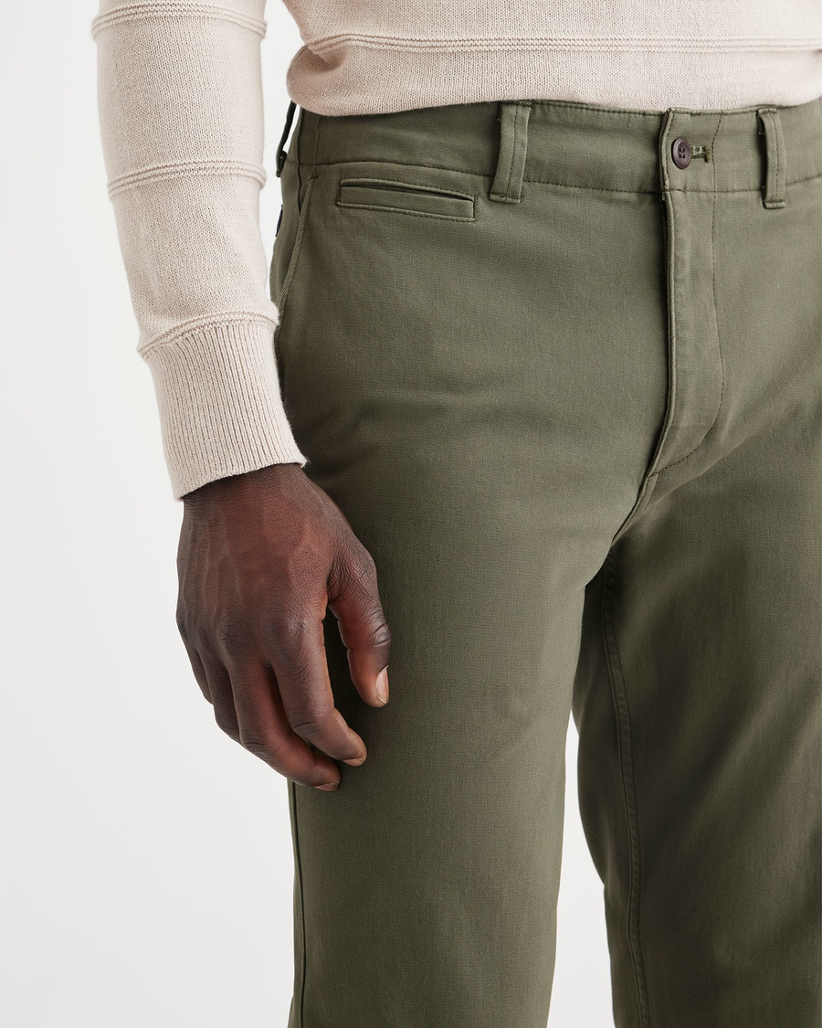 View of model wearing Army Green Alpha Chino Pants, Slim Fit.