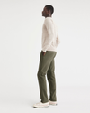 View of model wearing Army Green Alpha Chino Pants, Slim Fit.