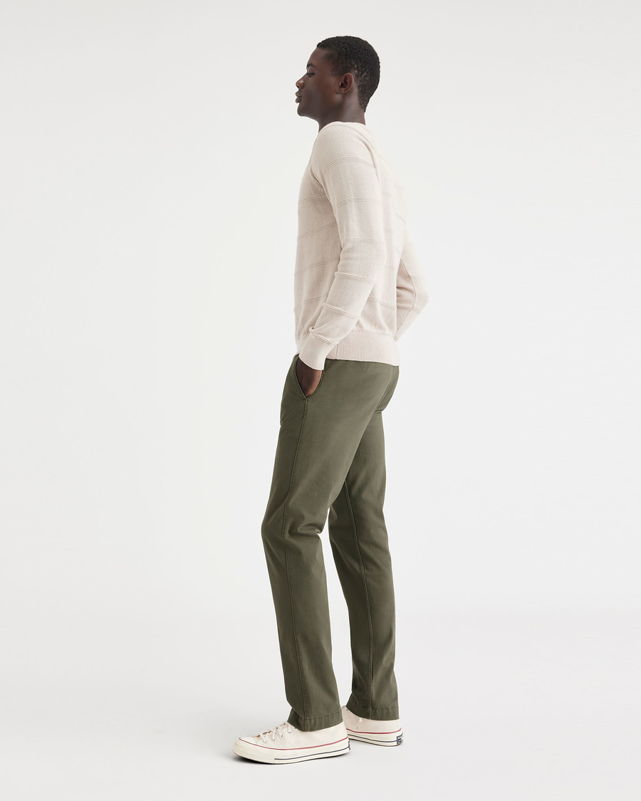 View of model wearing Army Green Alpha Chino Pants, Slim Fit.