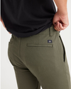 View of model wearing Army Green Men's Skinny Fit Smart 360 Flex California Chino Pants.