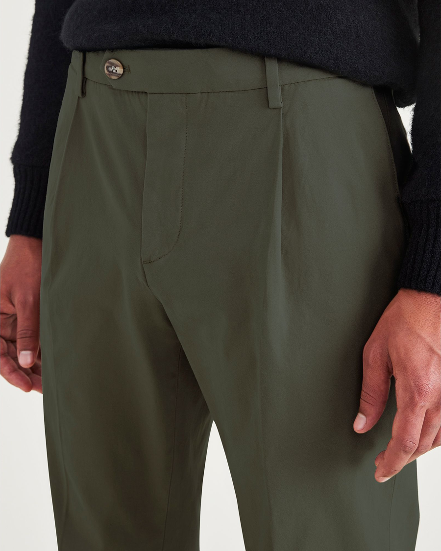 View of model wearing Army Green Men's Slim Tapered Fit Crafted Pants.