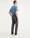 Back view of model wearing Asphalt Men's Slim Fit Original Chino Pants.