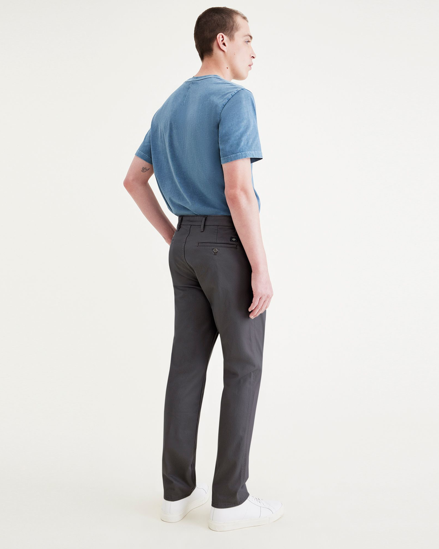 Back view of model wearing Asphalt Men's Slim Fit Original Chino Pants.