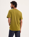Back view of model wearing Avocado Graphic Tee, Slim Fit.