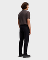 Back view of model wearing Beautiful Black Alpha Chino Pants, Straight Fit.