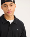 View of model wearing Beautiful Black Men's Regular Fit Go Polo.