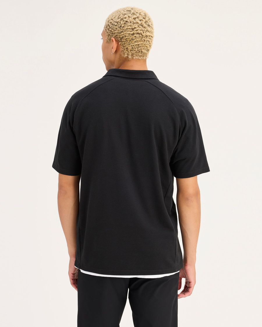 Back view of model wearing Beautiful Black Men's Regular Fit Go Polo.