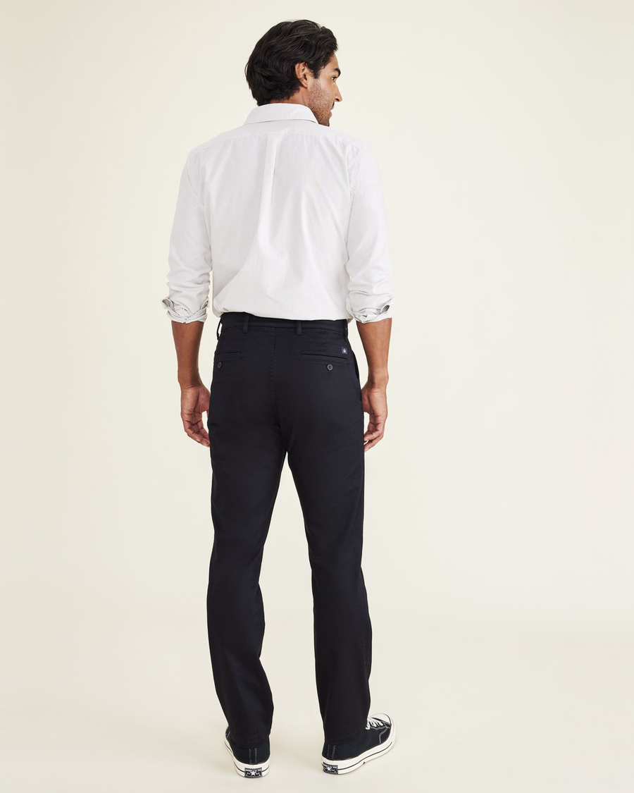 Back view of model wearing Beautiful Black Men's Slim Fit Original Chino Pants.
