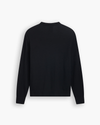 View of model wearing Beautiful Black V Neck Sweater.