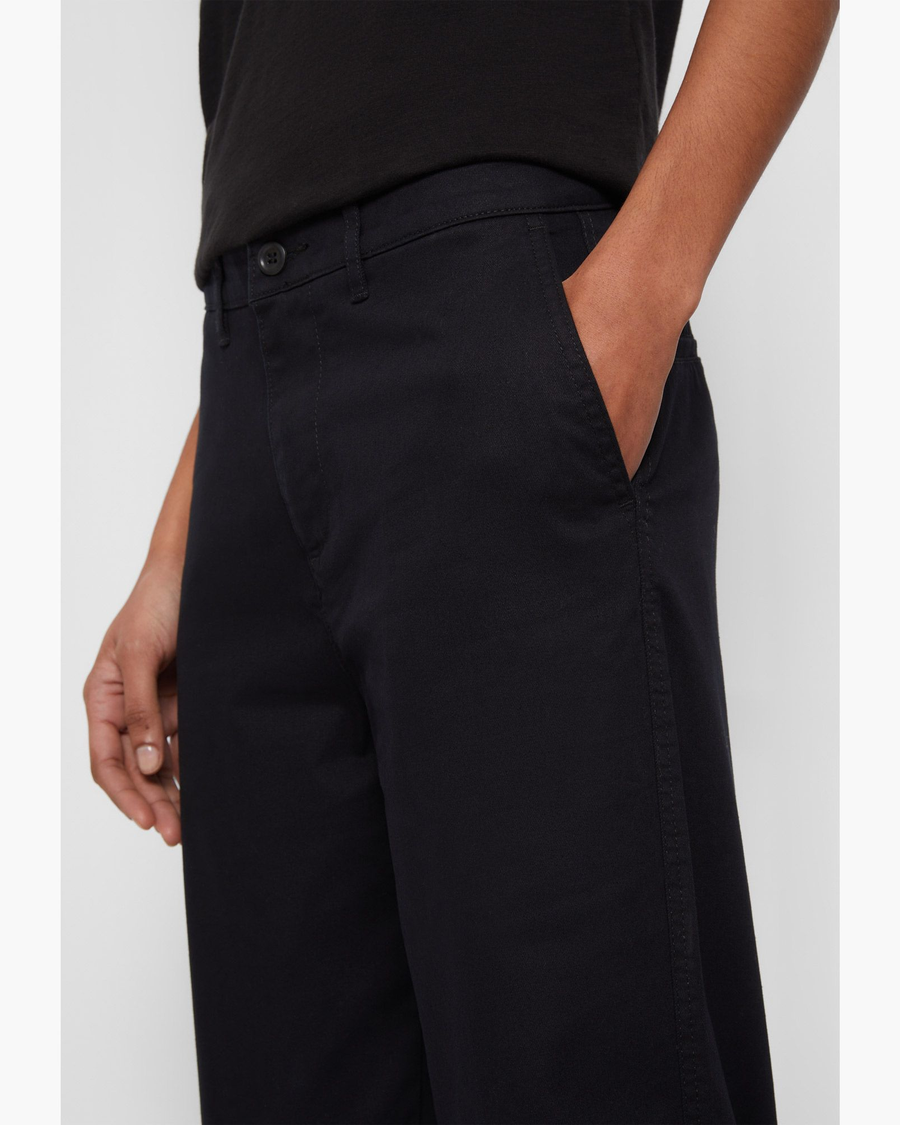 Side view of model wearing Beautiful Black Women's High Waisted Straight Fit Original Khaki Pants.