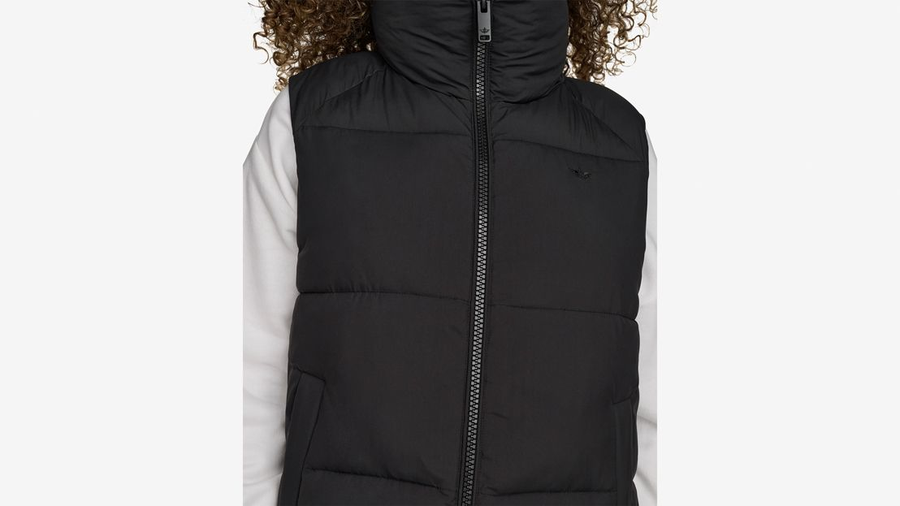 View of model wearing Beautiful Black Women's Puffer Vest Jacket.