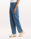 Side view of model wearing Bering Sea Blake Chino Pants, High Straight Fit.