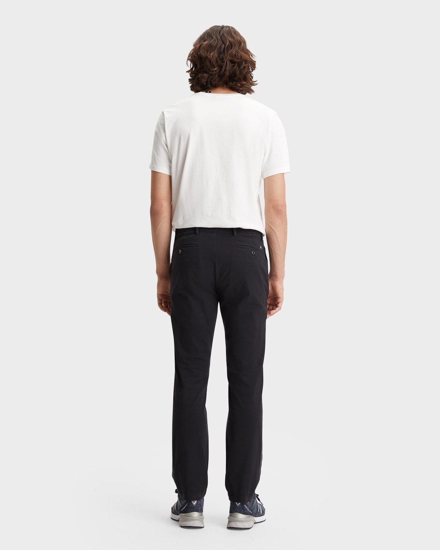 Back view of model wearing Black Crafted Khaki Pants, Slim Fit.