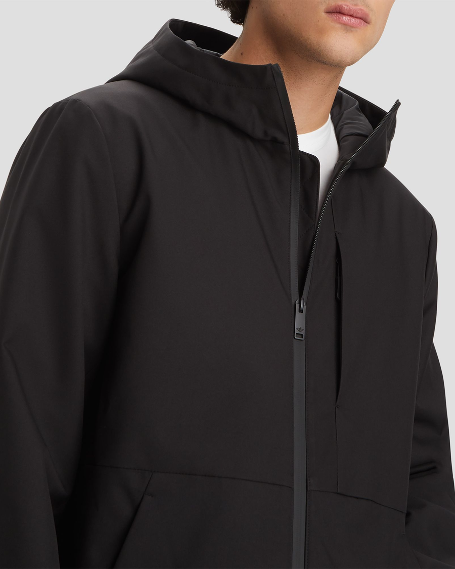 View of model wearing Black Men's Softshell Modern Jacket.