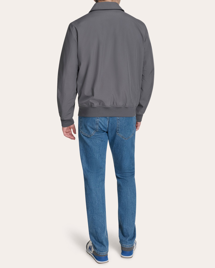 Back view of model wearing Boulevard Go Golf Bomber.