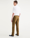 Back view of model wearing Bronze Brown Alpha Chino Pants, Slim Fit.