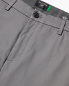 View of model wearing Burma Grey Signature Iron Free Khakis, Skinny Fit with Stain Defender®.