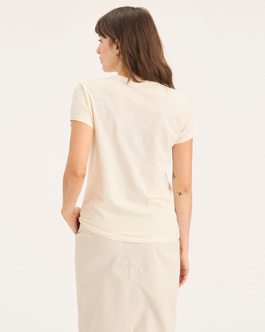 Back view of model wearing Buttercream Women's Slim Fit Graphic Tee Shirt.