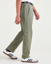 Side view of model wearing Camo Alpha Chino Pants, Slim Fit.