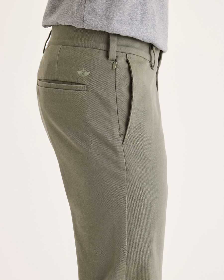 Side view of model wearing Camo Chino Go Activeflex, fit skinny.