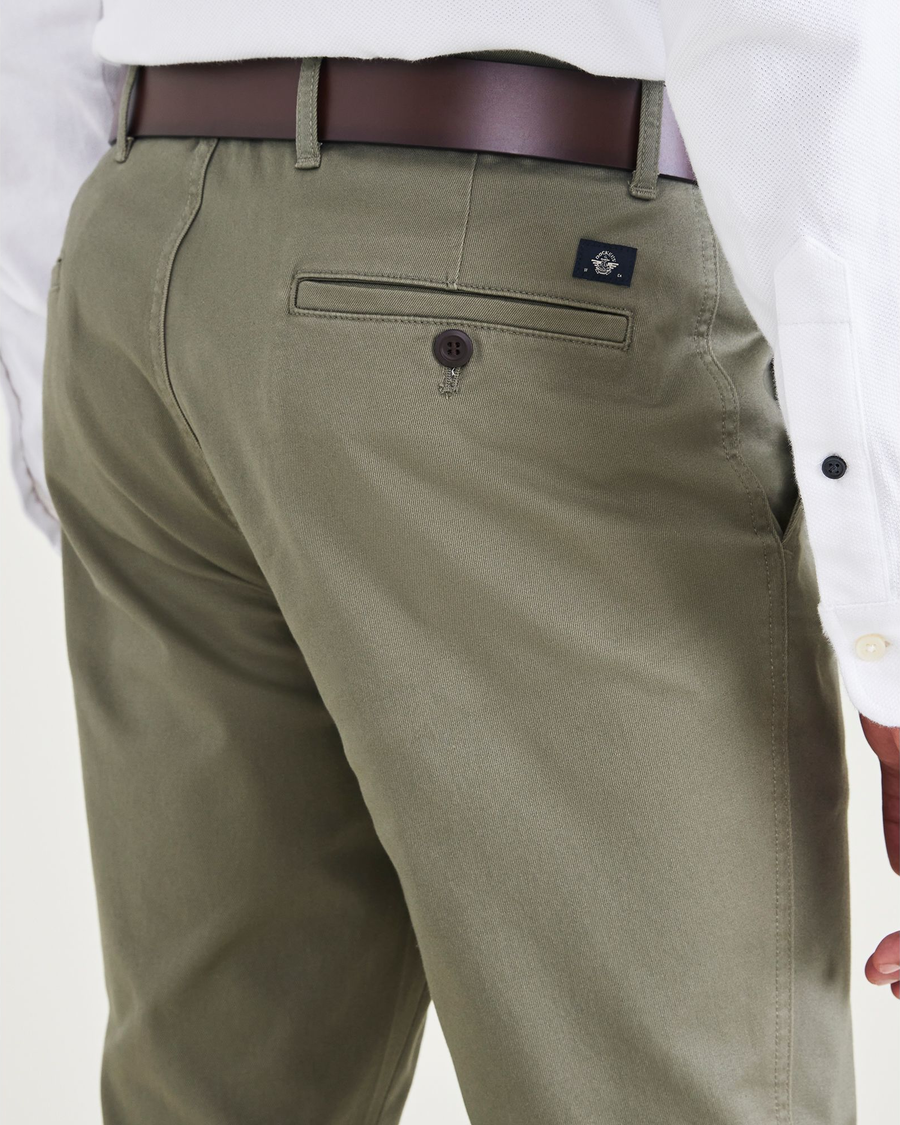 View of model wearing Camo Men's Skinny Fit Original Chino Pants.