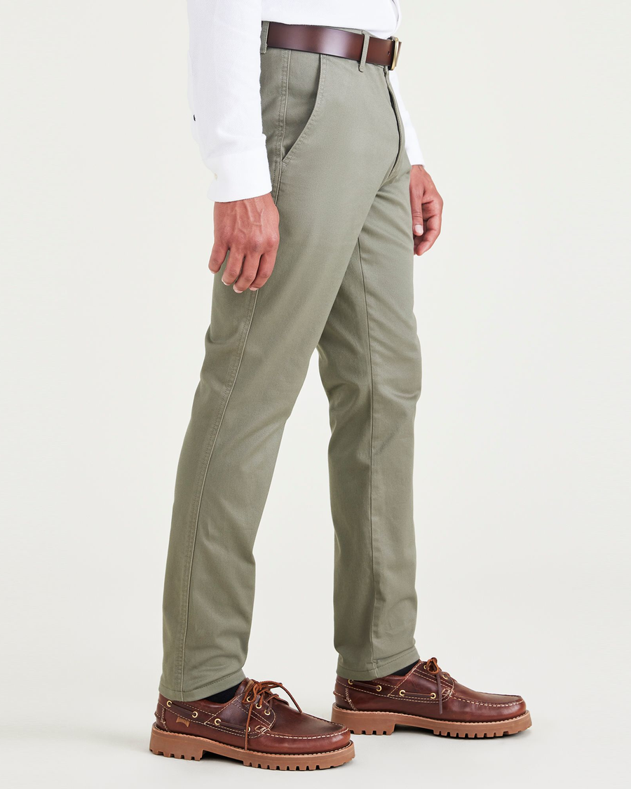Side view of model wearing Camo Men's Skinny Fit Original Chino Pants.