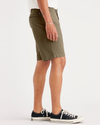 Side view of model wearing Camo Men's Straight Fit California Shorts.