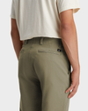 View of model wearing Camo Men's Straight Fit Smart 360 Flex California Chino Pants.