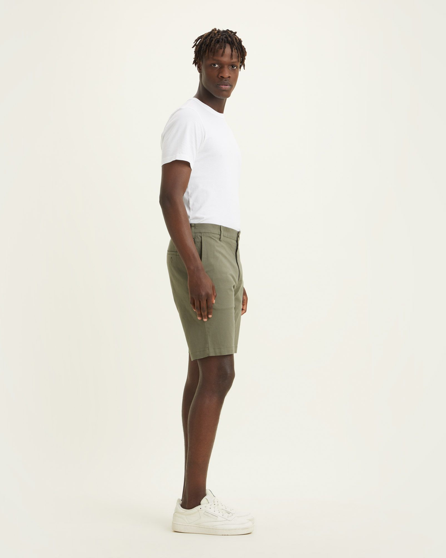 Side view of model wearing Camo Men's Supreme Flex Modern Chino Short.