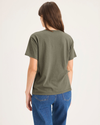 Back view of model wearing Camo Women's Deep V-Neck Tee Shirt.