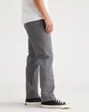 Side view of model wearing Car Park Grey Men's Slim Fit Original Chino.