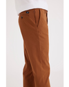 Side view of model wearing Caramel Café Crafted Khaki Pants, Slim Fit.