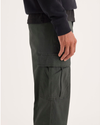 Side view of model wearing Chimera Utility Cargo Pant, Straight Fit.