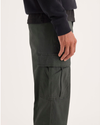 Side view of model wearing Chimera Utility Cargo Pant, Straight Fit.
