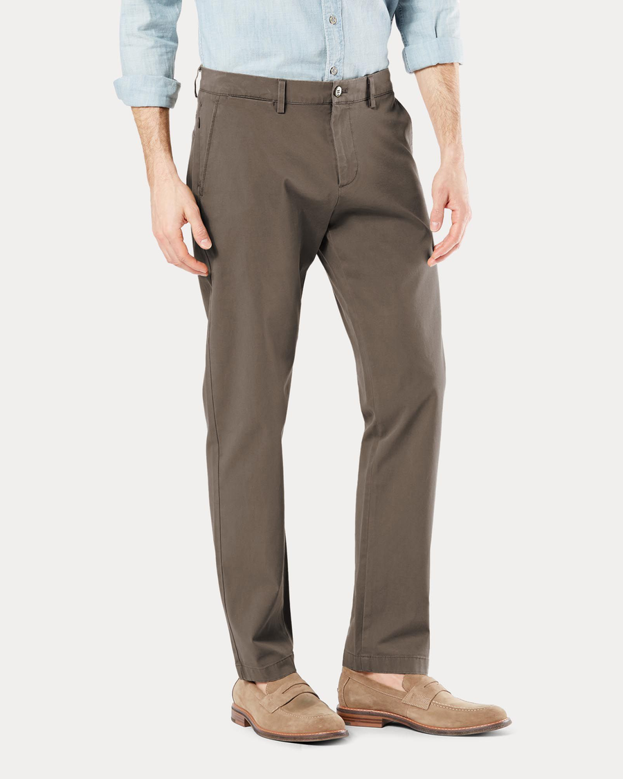 Side view of model wearing Chocolate Chip Crafted Khaki Pants, Slim Tapered Fit.
