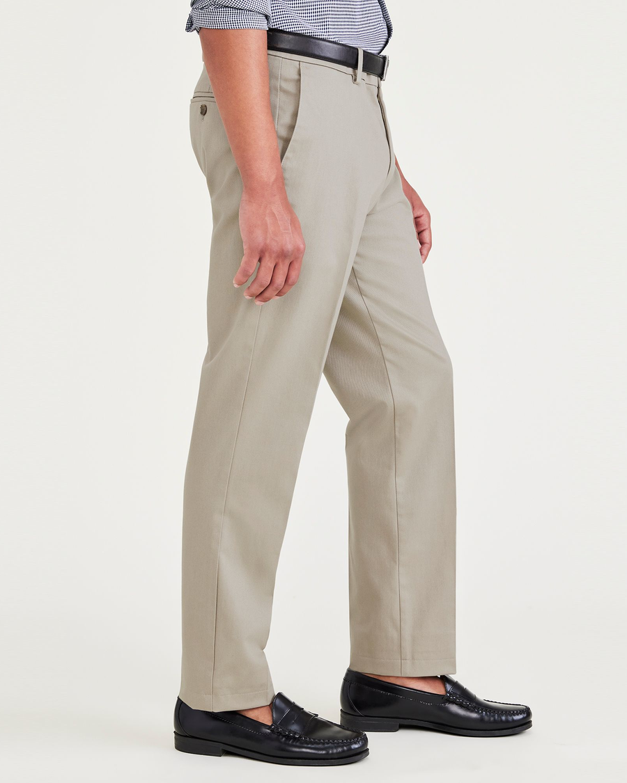 Side view of model wearing Cloud Signature Iron Free Khakis, Creased, Slim Fit with Stain Defender®.