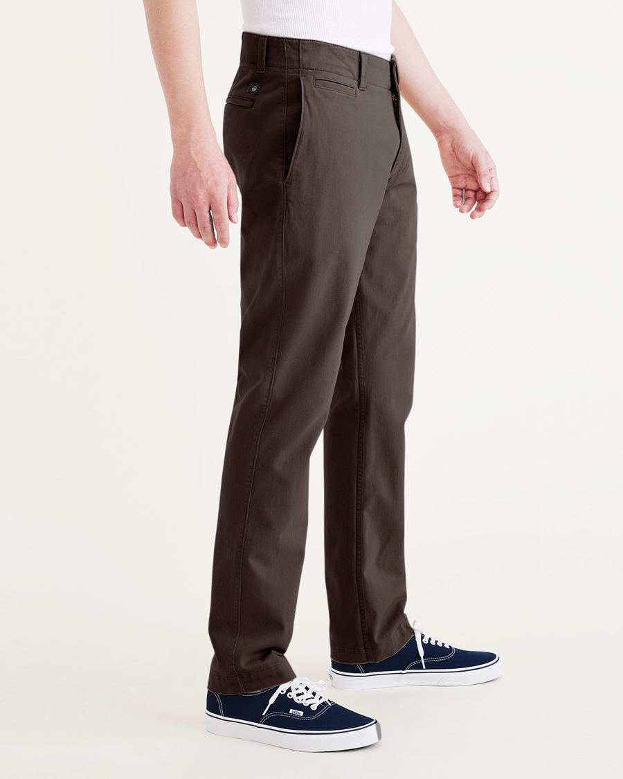 Side view of model wearing Coffee Bean Alpha Chino Pants, Slim Fit.