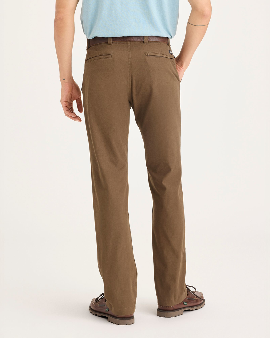 Back view of model wearing Coffee Liquer Alpha Chino Pants, Slim Fit.