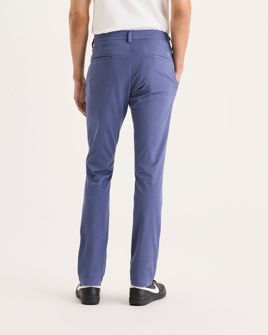 Back view of model wearing Crown Blue Chino Go Activeflex, fit skinny.