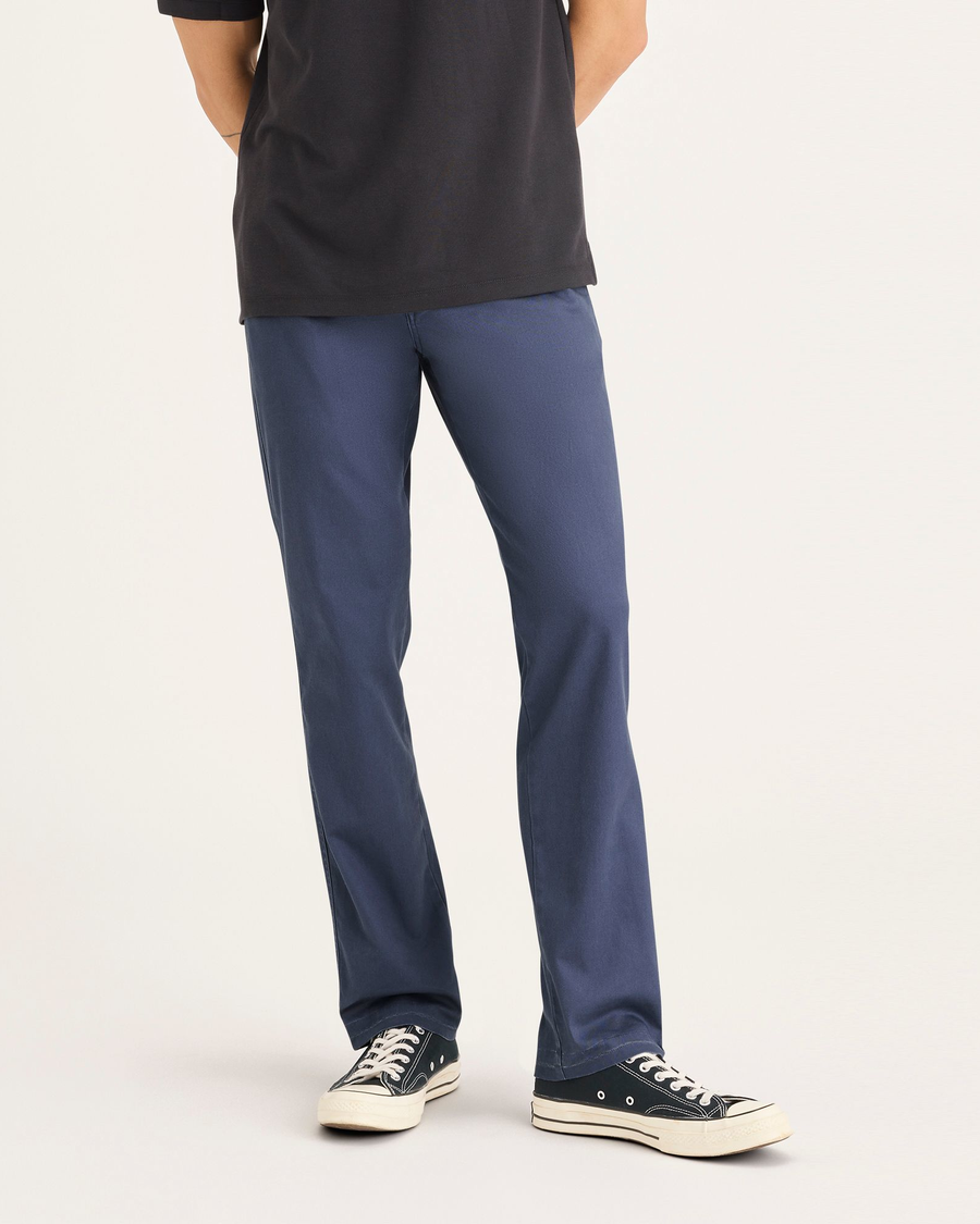 Front view of model wearing Crown Blue Men's Slim Fit Original Chino Pants.