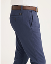 Side view of model wearing Crown Blue Men's Smart 360 Flex Ultimate Chino.