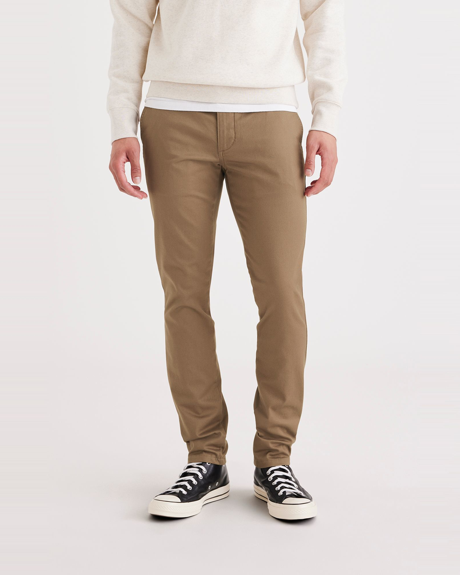 Front view of model wearing Cub Men's Skinny Fit Original Chino Pants.