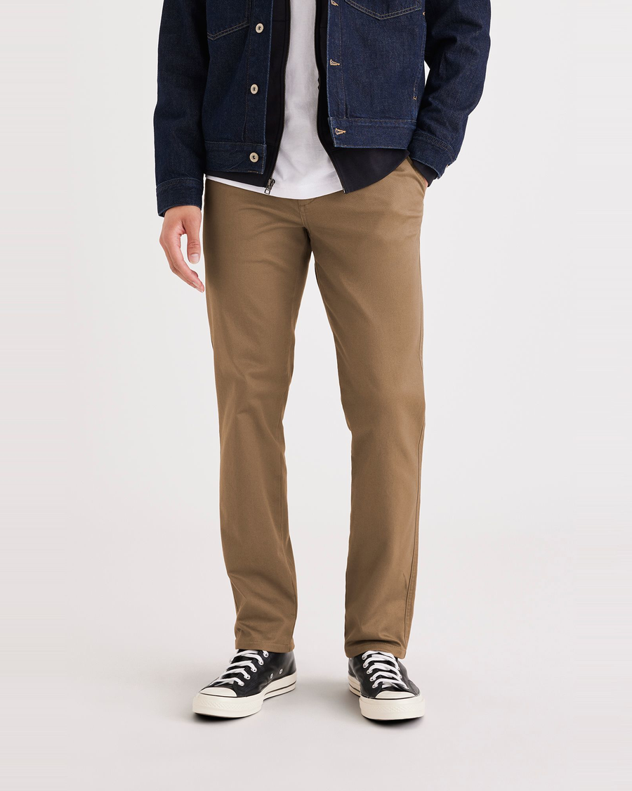 Front view of model wearing Cub Men's Slim Fit Original Chino Pants.