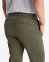 View of model wearing Deep Depths Men's Skinny Fit Supreme Flex Alpha Khaki Pants.