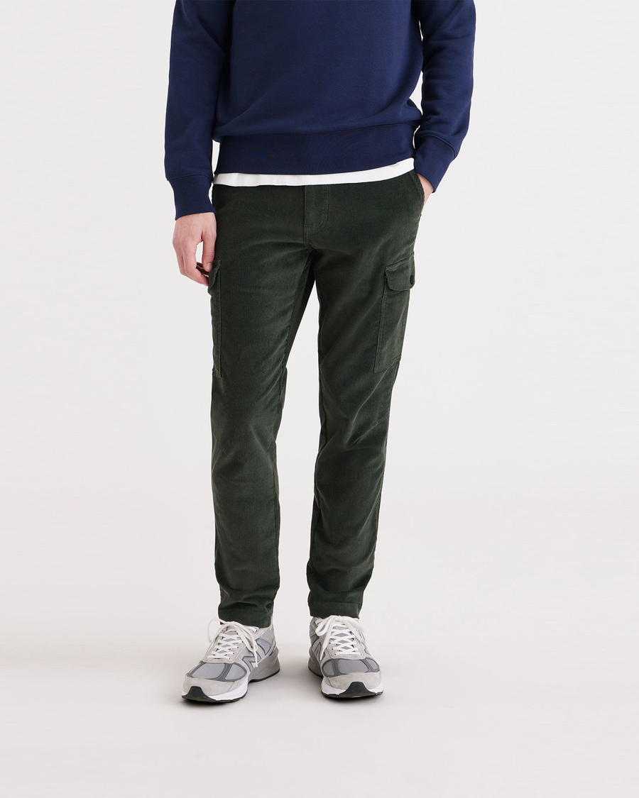 Front view of model wearing Deep Forest Men's Slim Tapered Fit Cargo Pants.