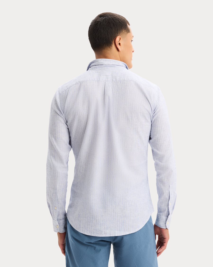 View of model wearing Deep Ultramarine Icon Button Up Shirt, Slim Fit.
