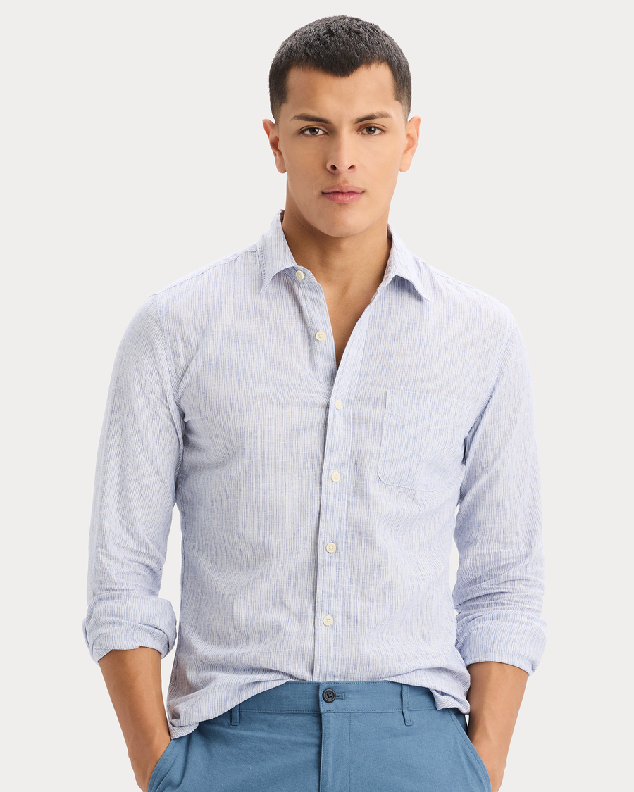 View of model wearing Deep Ultramarine Icon Button Up Shirt, Slim Fit.