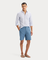 View of model wearing Deep Ultramarine Icon Button Up Shirt, Slim Fit.