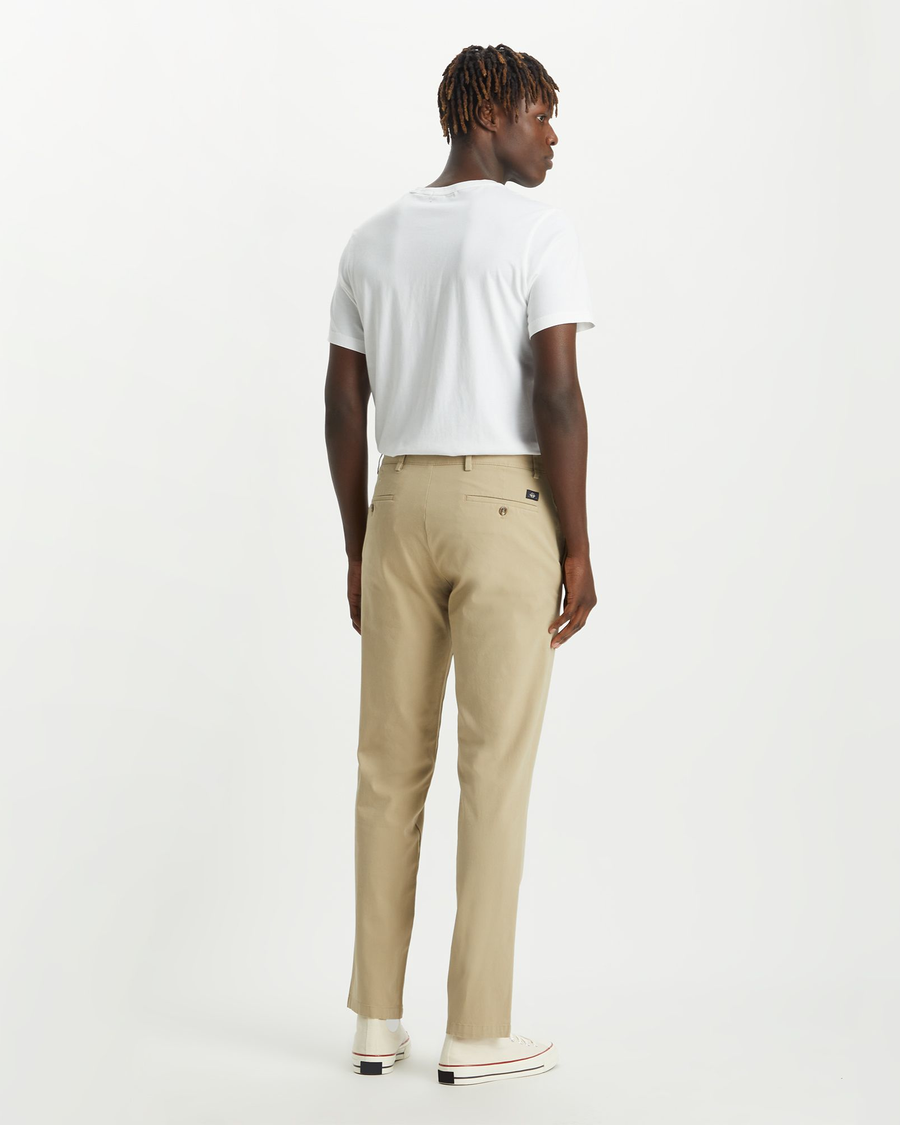 Back view of model wearing Dockers Khaki Crafted Khaki Pants, Slim Fit.