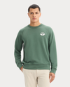 Front view of model wearing Duck Green Icon Crewneck Sweatshirt, Regular Fit.